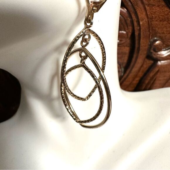 Anne Klein gold tone orbital oval lever earrings - Picture 6 of 8